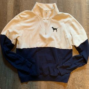 Pink quarter zip blue and white sweater